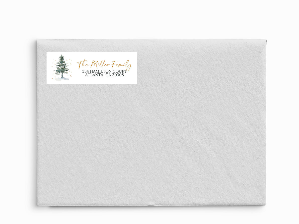 White envelope with a return address label featuring a tree design on a white background