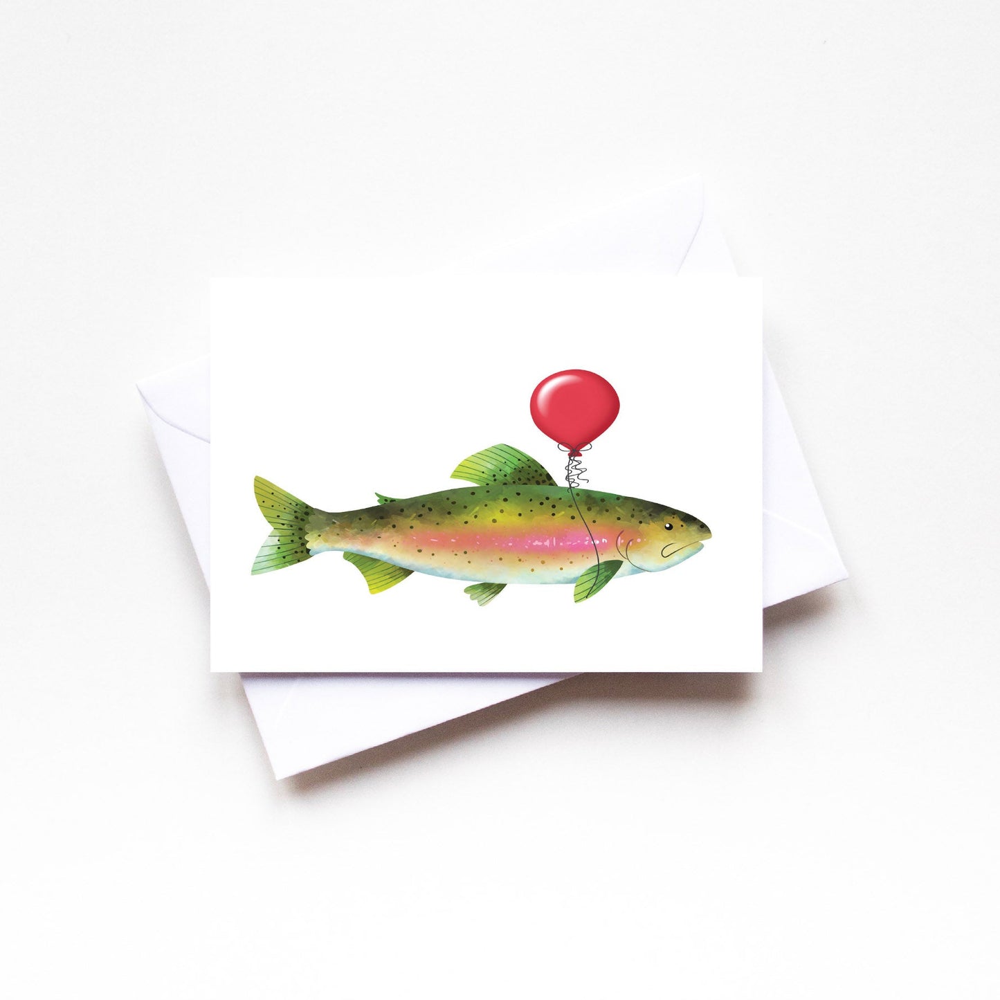 Card with a fish holding a red balloon on a white background