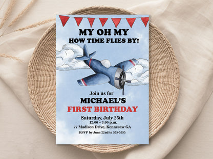 Birthday invitation card with airplane design on a woven mat