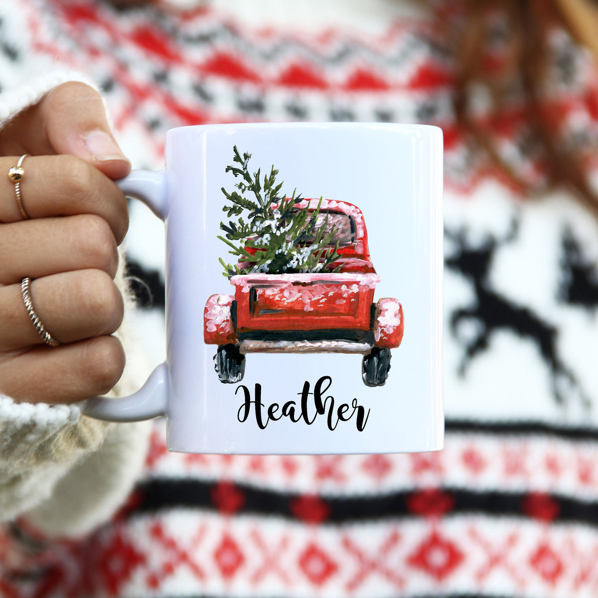 Personalized Christmas coffee mug featuring a vintage red pickup truck carrying a Christmas tree through a snowy winter landscape, rustic farmhouse holiday design with custom name.