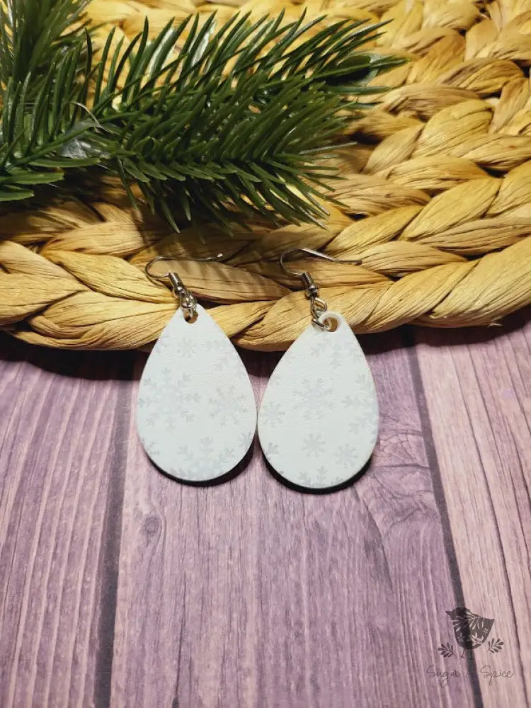 White Snowflake Holiday Dangle Earrings - Premium  from Sugar and Spice Invitations - Just $11.25! Shop now at Sugar and Spice Paper