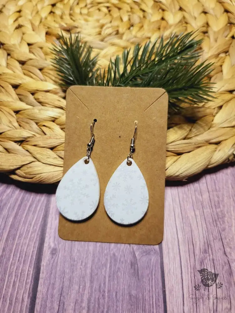 White Snowflake Holiday Dangle Earrings - Premium  from Sugar and Spice Invitations - Just $11.25! Shop now at Sugar and Spice Paper